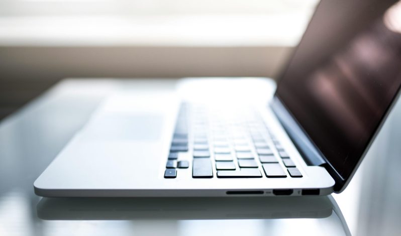 shallow-focus-photography-of-macbook